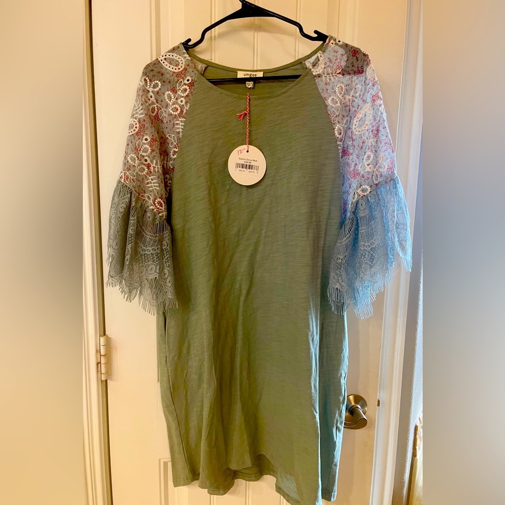 Umgee New with tags. Long shirt or short dress.